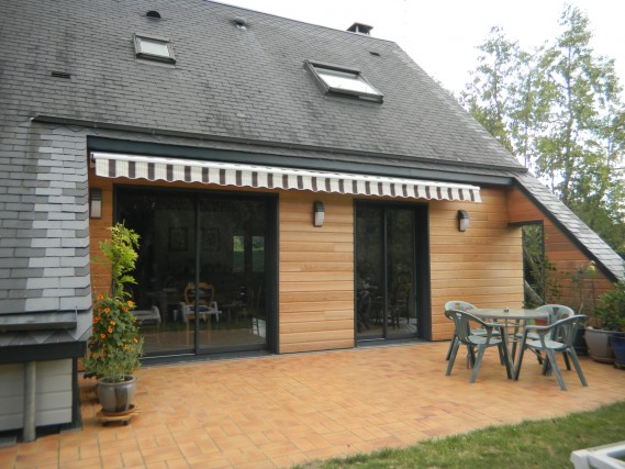 Rénovation d'une maison bois de 1970 avec bardage et isolation extérieure